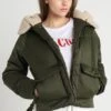 URBAN CLASSICS Ladies Sherpa Hooded Jacket - Winterjas - Dark Olive/Dark Sand -Urban Classics 115767a34bd44322954cb92a7927724e