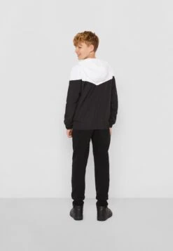 URBAN CLASSICS Unisex Arrow- Jas - White Black -Urban Classics ce4c2bbc1e194afda94ab44d04a07477